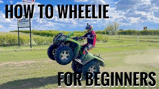 How To Wheelie An ATVQUAD For BEGINNERS [upl. by Nedle]