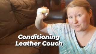 Taking care of leather couches by conditioning with olive oil [upl. by Nosidda379]