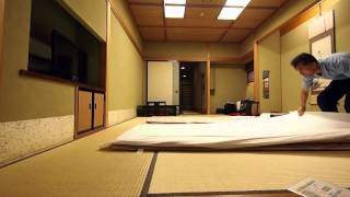 Making up a futon bed at Japanese traditional Ryokan [upl. by Ahsas]