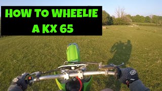 How to wheelie a Kx 65 💪 [upl. by Htezzil]