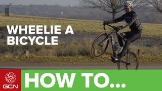 How To Wheelie A Bicycle [upl. by Boelter]