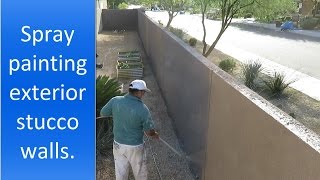 Spray painting exterior stucco walls [upl. by Huntlee]