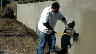 Stucco sprayer hopper gun [upl. by Dnalrag]